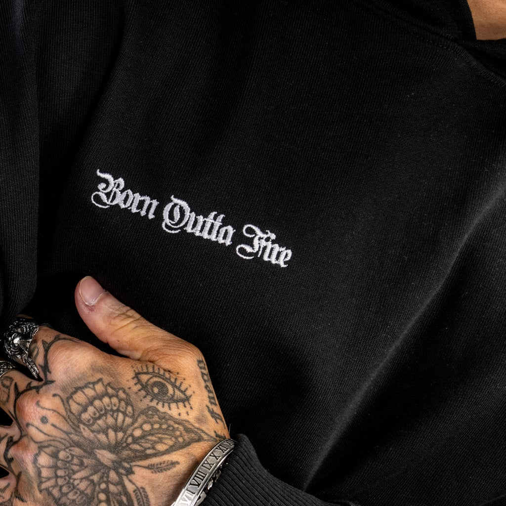 embroidered detail on front of sweatshirt