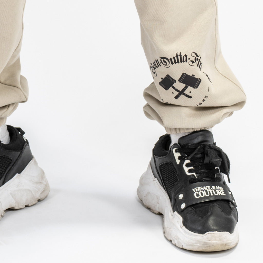 Shin print on sand tracksuit bottoms from born outta fire