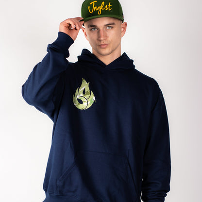 Person wearing a navy Junglist hoodie with a green logo and a green cap with yellow text on a white background