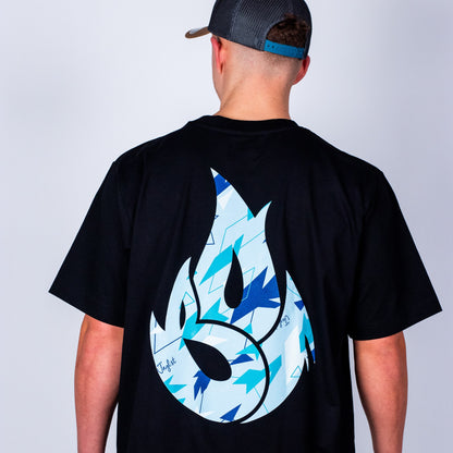 Person wearing a black t-shirt with a blue camo design on the back against a plain background