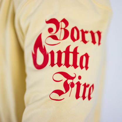 White sweatshirt with red text 'Born Outta Fire' on a plain background