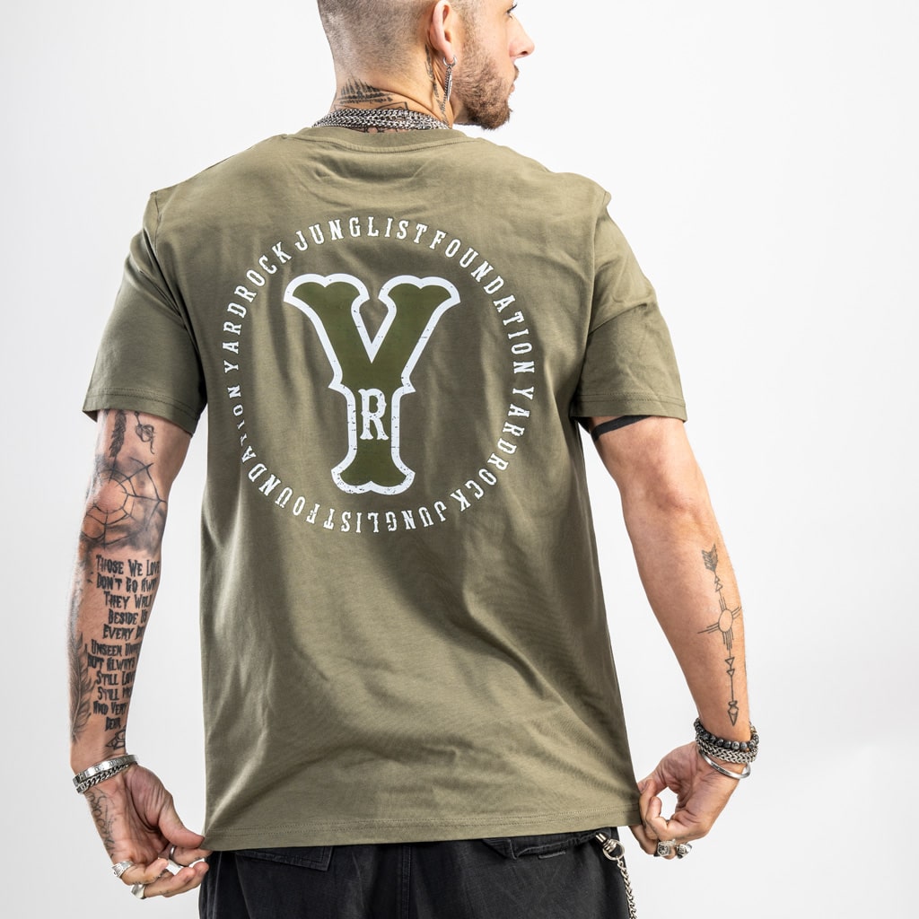 large distressed vintage print on back of army green t shirt