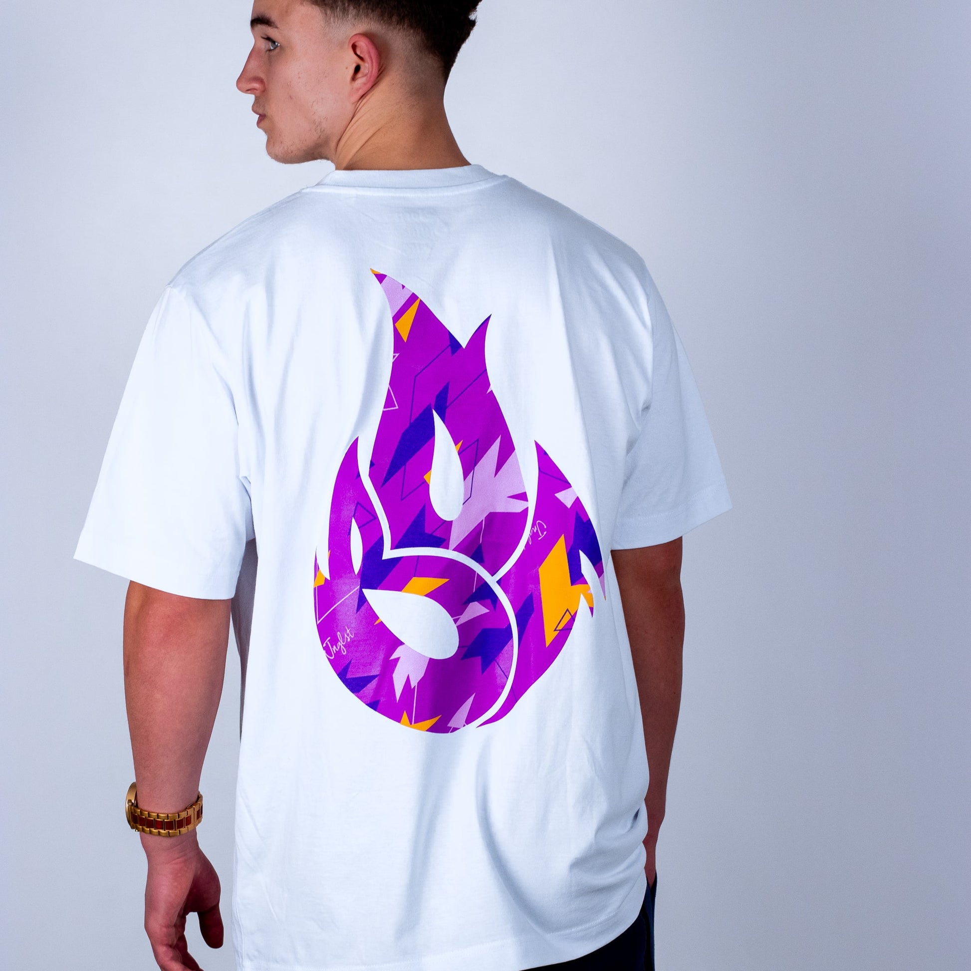 Person wearing a white BOF t-shirt with a purple camo flame logo on the back against a plain background