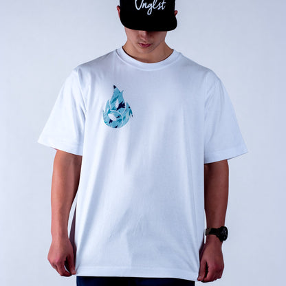 Person wearing a white t-shirt with a blue graphic design on a plain background